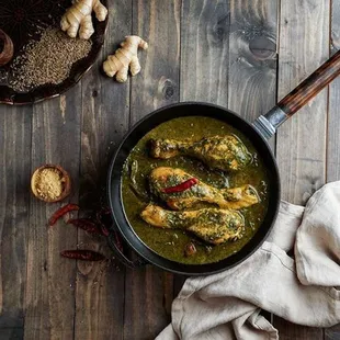 a pan of chicken curry