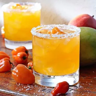 two cocktails with mango and mango