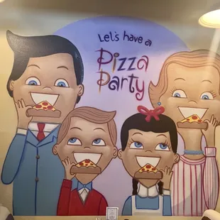 a family eating pizza