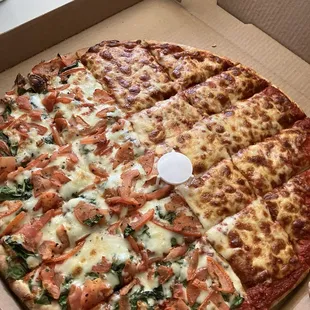 Large half cheese half sliced tomato and spinach. Yummeee!