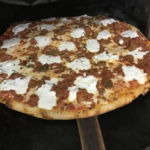 a pizza being cooked in an oven
