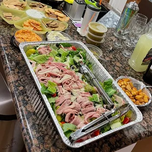 See the creamy Italian dressing. Green in color? Pan of croutons too. This pic was taken after people has already eaten a bunch of it