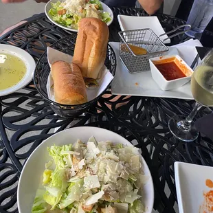 Two Cesar salads, the complimentary bread and oil and herb mix they give and some mozzarella sticks to start.