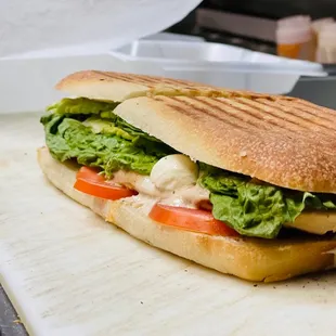 a sandwich on a cutting board