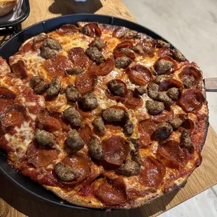 Medium pepperoni and sausage pizza