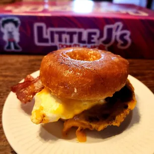 Holy goodness! Get the Hangry! Donut instead of a biscuit with egg, bacon, sausage, butter, cheese, grease!!! Good!
