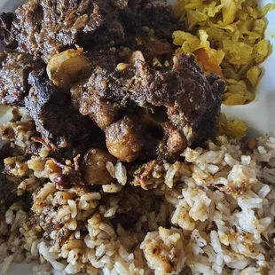 a plate of food with rice and meat