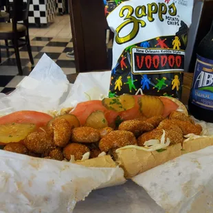 Shrimp po&apos;boy...wash it down with Abita Rootbeer..and voodoo magic will put you in a wonderful food coma.