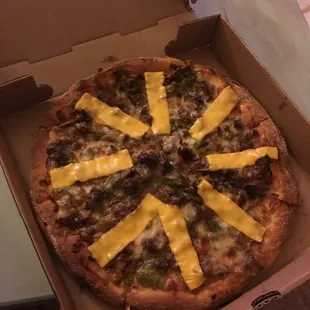 I can't believe this is the "cheesesteak" pizza. Processed cheese slices....