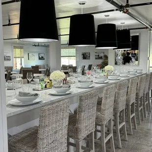 Beautiful long tables to eat with community.