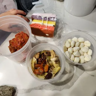 Meatballs, potato gnocchi, antipasto salad, I canoli love you cake
