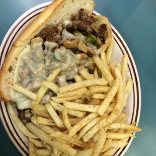 Philly steak and cheese. Fries are extra :)