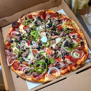large everything pizza $34.50 (includes tax)