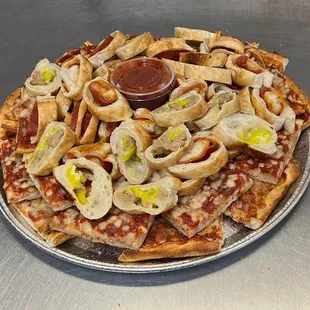 a pizza with a lot of toppings