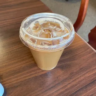 Latte with cocoa bitters. It does have a special name but can't remember