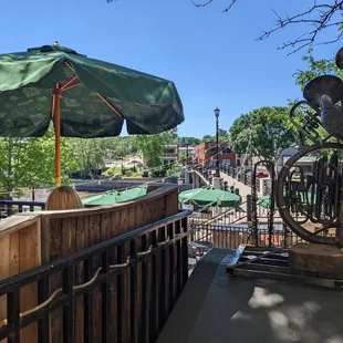Sweet back patio in the breezy shade of a locust, overlooking the Cannon River