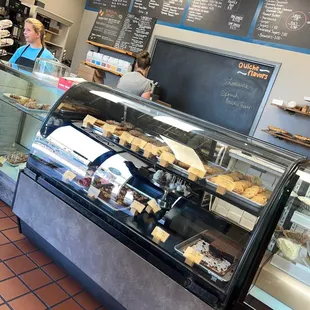 a woman behind the counter