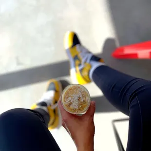 a person holding a cup of coffee