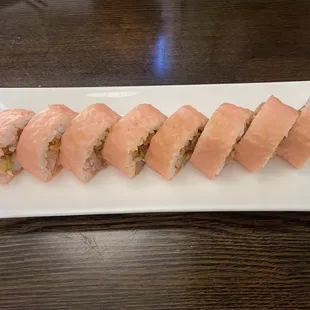 a plate of sushi rolls