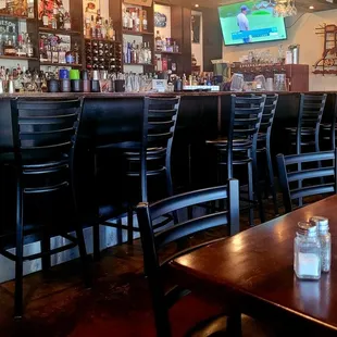 a row of chairs and a television