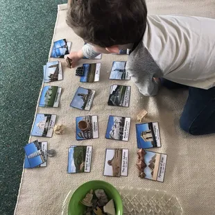 Montessori work cycle: identifying world landmarks