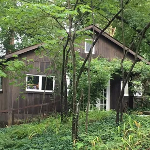 Wisteria cabin, the Little Loomhouse gallery and gift shop