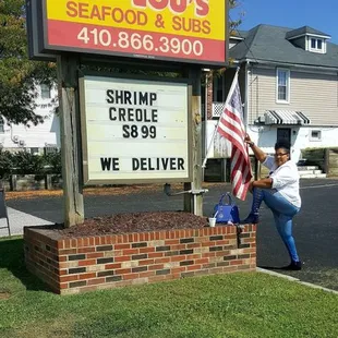 a man holding an american flag