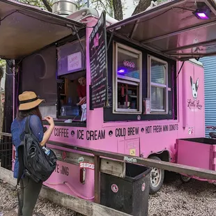 Cute and very pink truck serving up fresh mini donuts