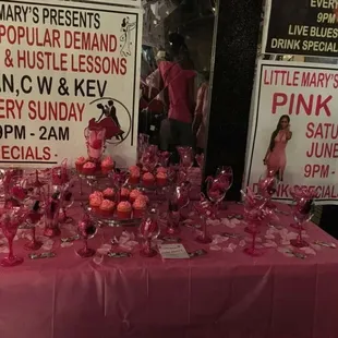 a table of pink party glasses