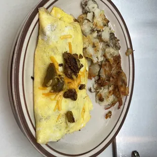 Chorizo and Green Chile &amp; Cheddar Omelette