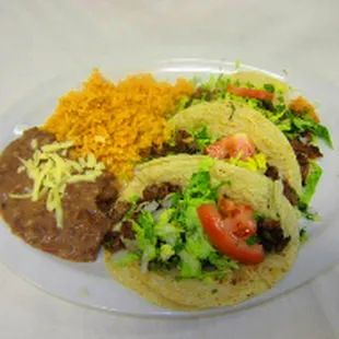 a plate of tacos and rice