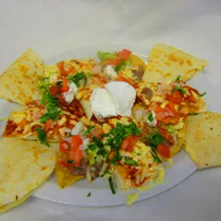 a plate of nachos with sour sour sour sour sour sour sour sour sour sour sour sour sour sour sour sour sour