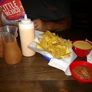 Chips with their original cheese dip, mild and hot  salsa, and their famous sauce thats good on everything!! It's all homemade