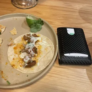 1 street taco $3 had to add cheese dip sauce what a sad Sade taco