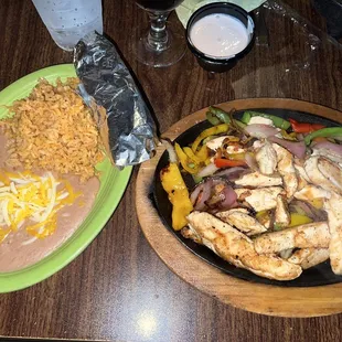Chicken fajitas, rice and beans.