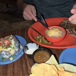 Queen ribeye, beans and loaded baked potato.