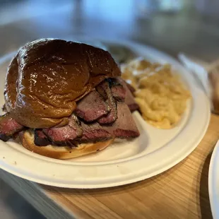 Brisket Sandwich and side of Mac and cheese.