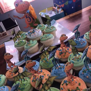 Birthday cupcakes with custom toppers