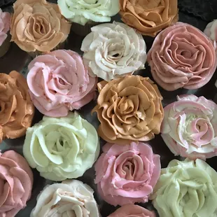 A bouquet of floral cupcakes for a baby shower