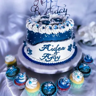 Blue/Silver smash cake with matching cupcakes