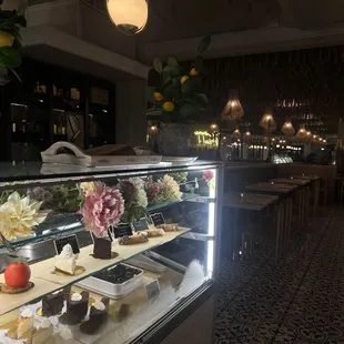 Dessert display and a large portion of the restaurant&apos;s indoor seating