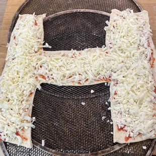 custom "H" XL pizza with extra cheese