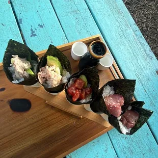 Lobster, california, spicy tuna, and hamachi rolls