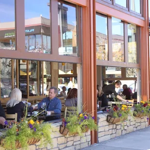 Seating with open windows and patio seating available!