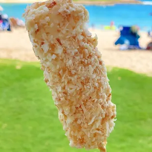 Frozen dipped pineapple