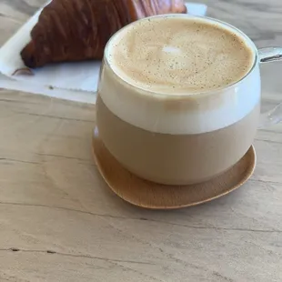 Vanilla Oatmilk latte and buttery croissant