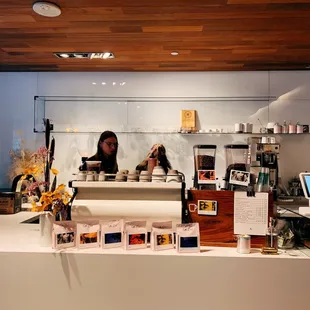 a woman behind the counter