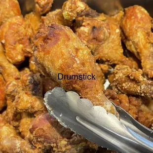 a closeup of a spoon and wings