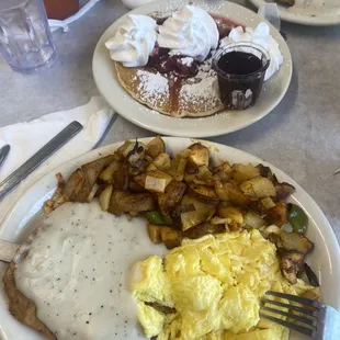 two plates of breakfast food