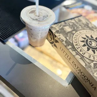 a cup of coffee and a book